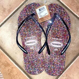 Brand new havaianas flip flops size 11/12. Super cute and sparkly